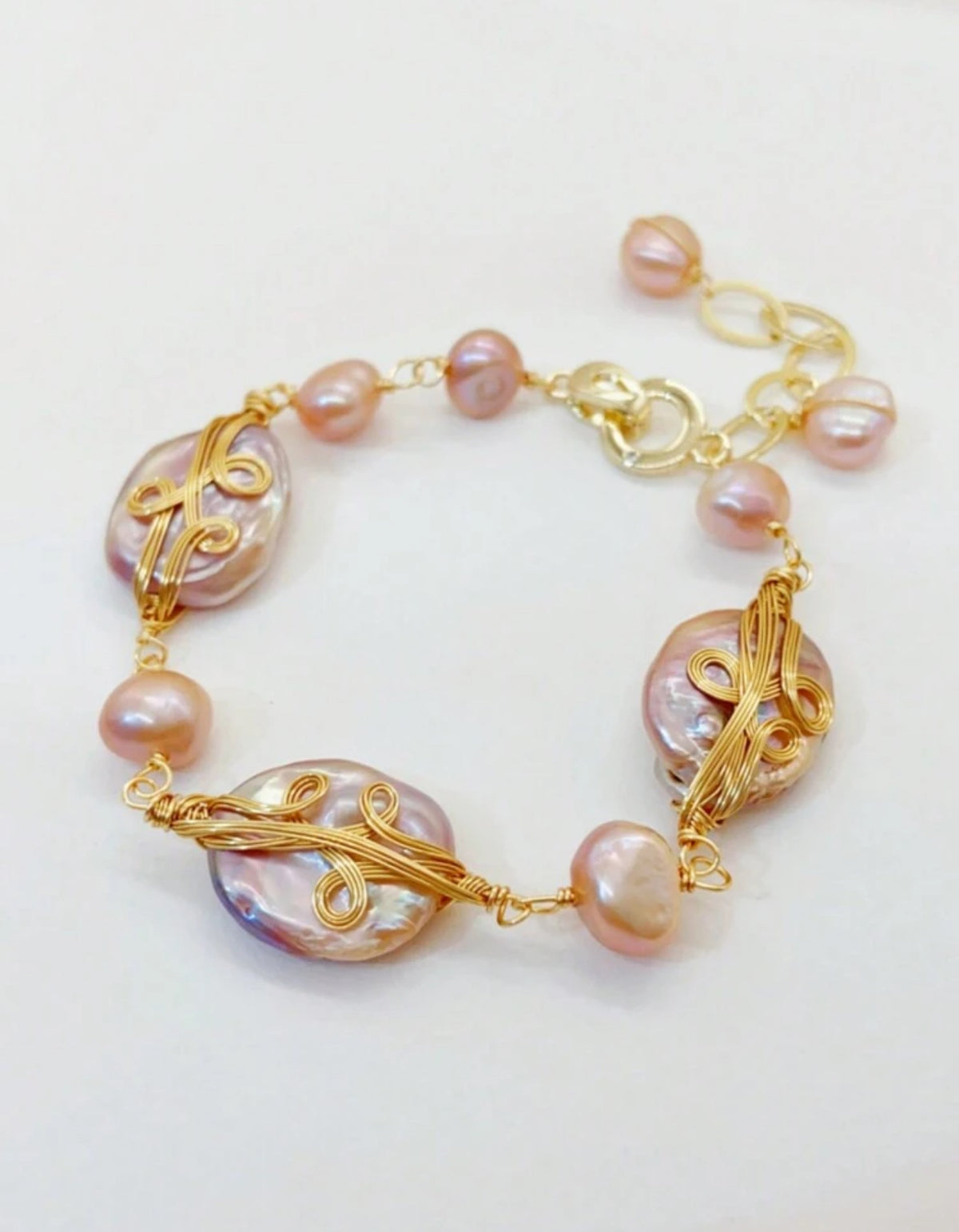 BRAZALETE PERLA TONO ROSA