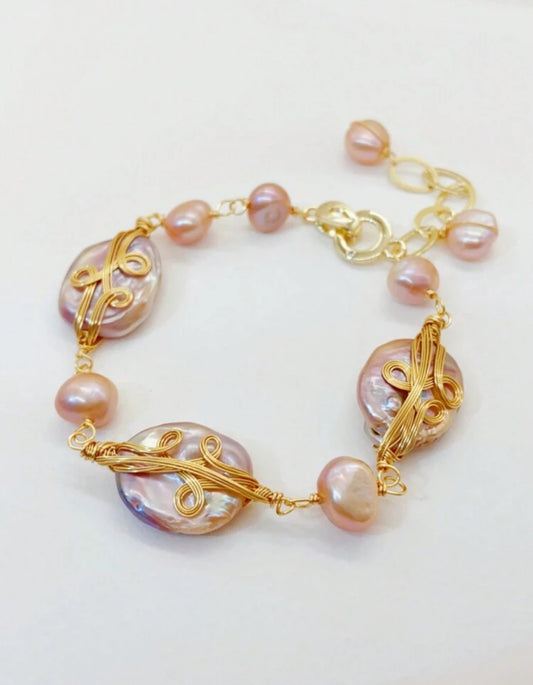 BRAZALETE PERLA TONO ROSA
