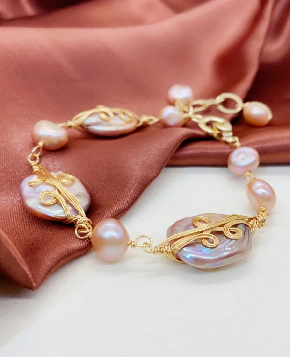 BRAZALETE PERLA TONO ROSA